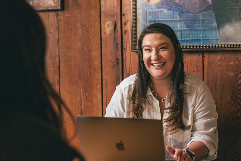 Nicole Moss interviewing a potential job candidate for a client